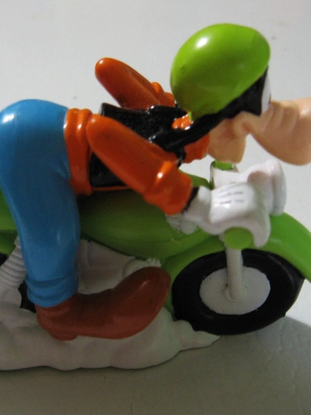 Disney' s Goofy riding motorcycle pencil sharpener